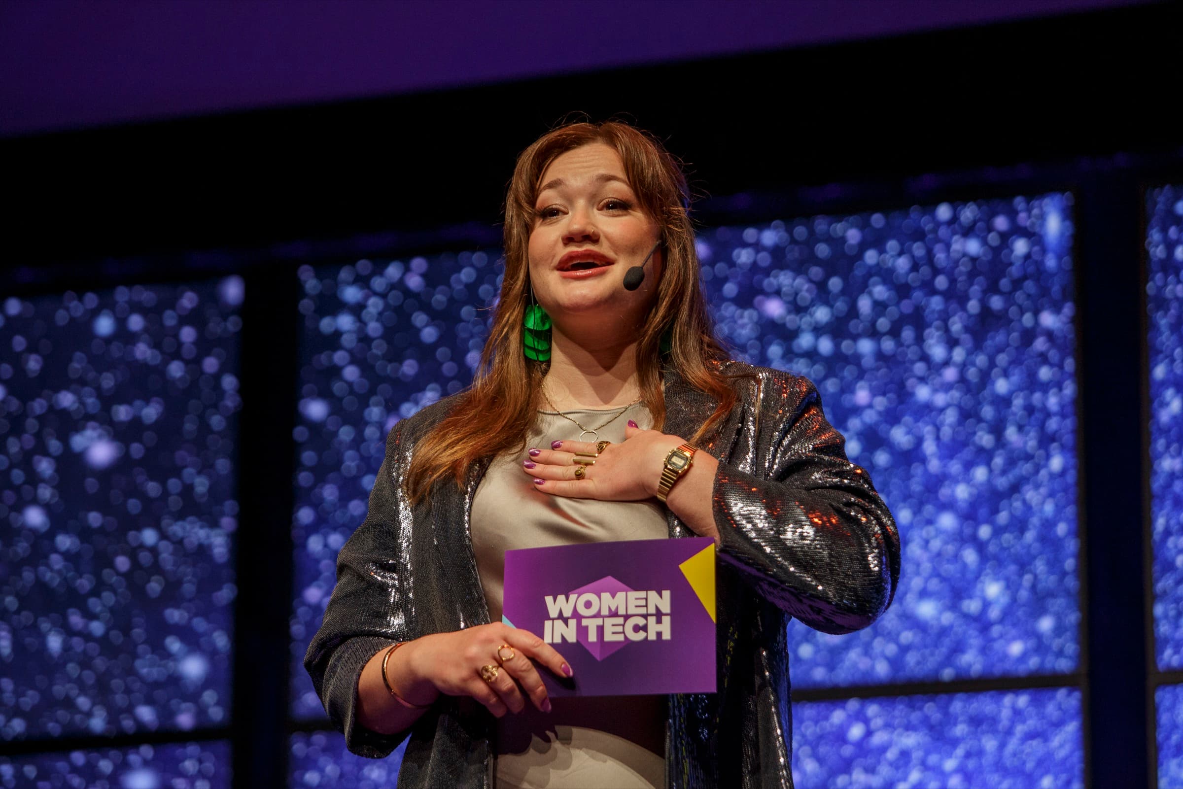 Stephanie speaking on stage, photo by Jezzica Sunmo