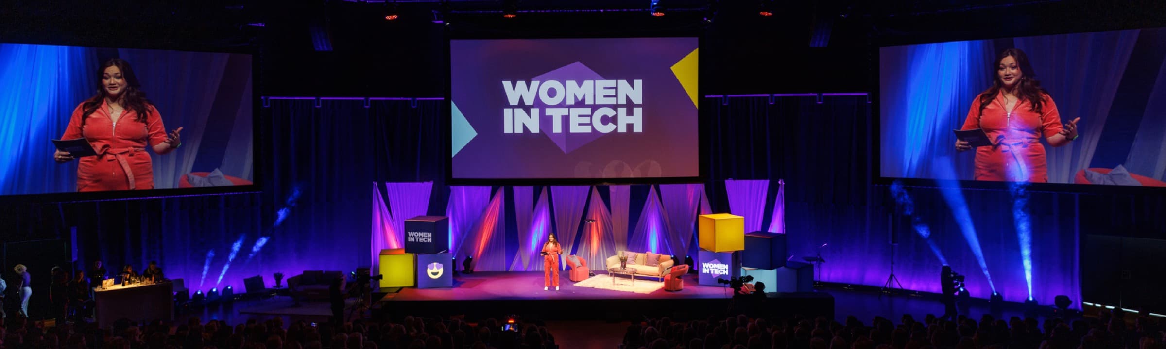 Stephanie on stage at Women in Tech 2024